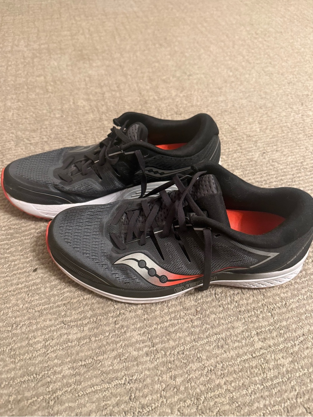 Saucony Black Sneakers with Bright Orange Insole
